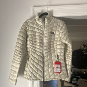 Brand new, never worn women’s North Face size small, “vaporous grey” down jacket